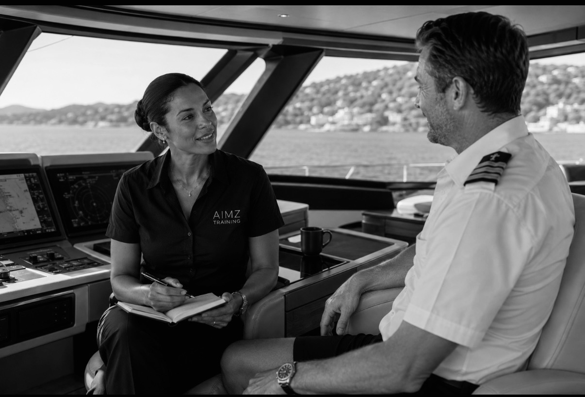 A stewardess and Captain in conversation on the bridge