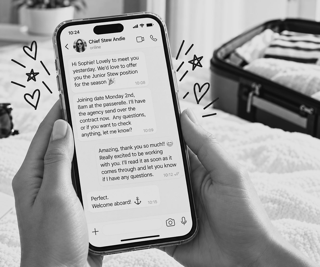 Hands holding a phone showing a message from a Chief Stew offering Sophie a Junior Stew position for the season, with her happy reply, and a half-packed suitcase on the bed behind